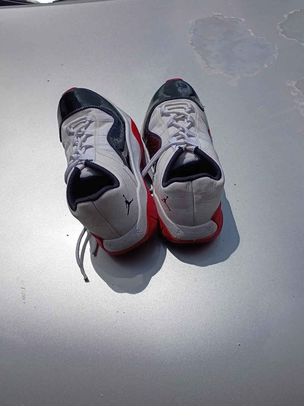 Jordan Low Top Sneakers in White, Black & Red